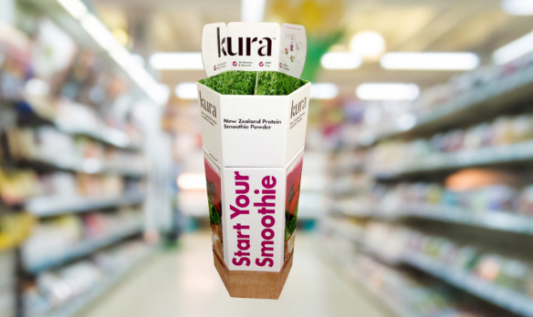 a display of kura smoothie in a grocery store