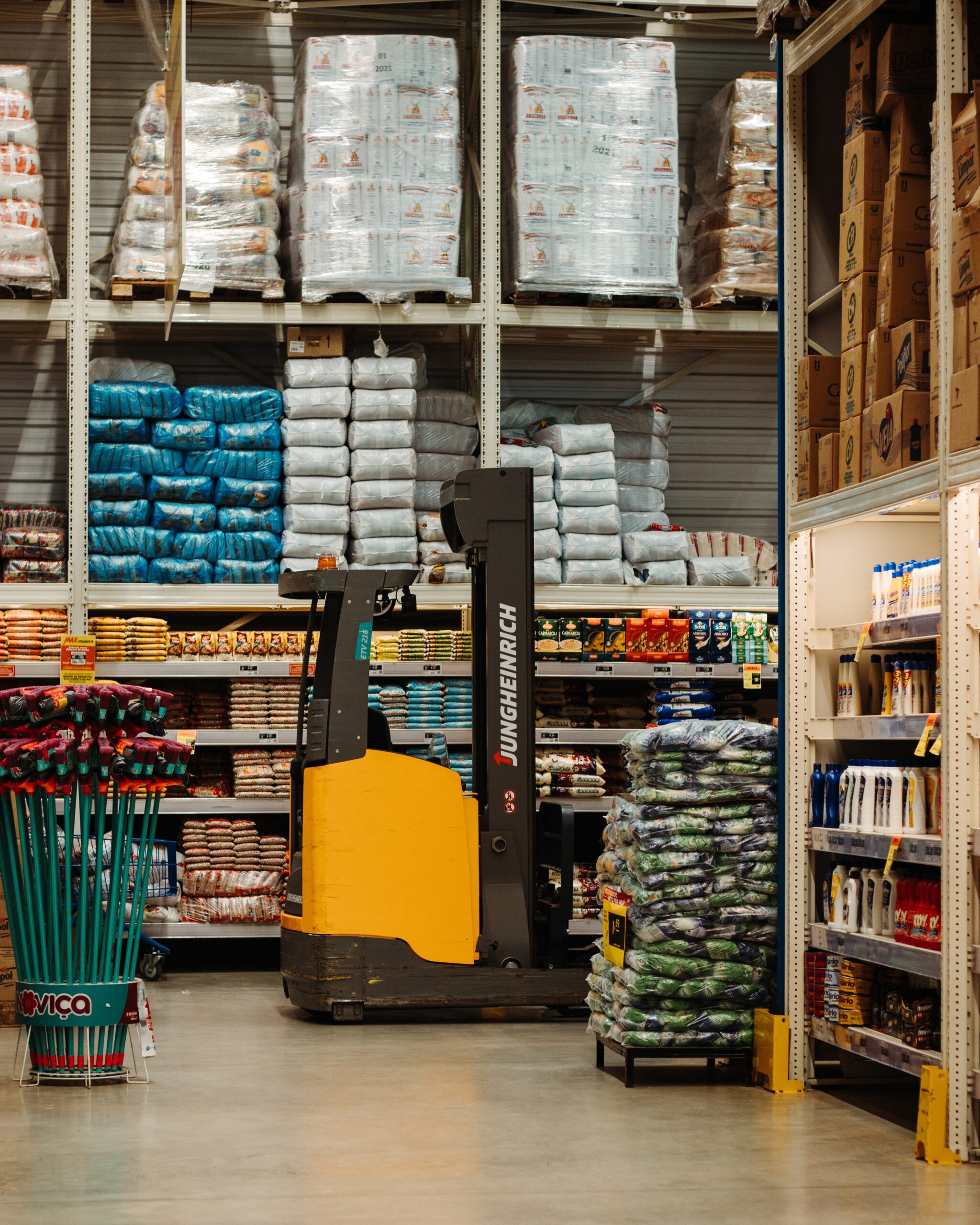 Forklift in a store near pallet displays