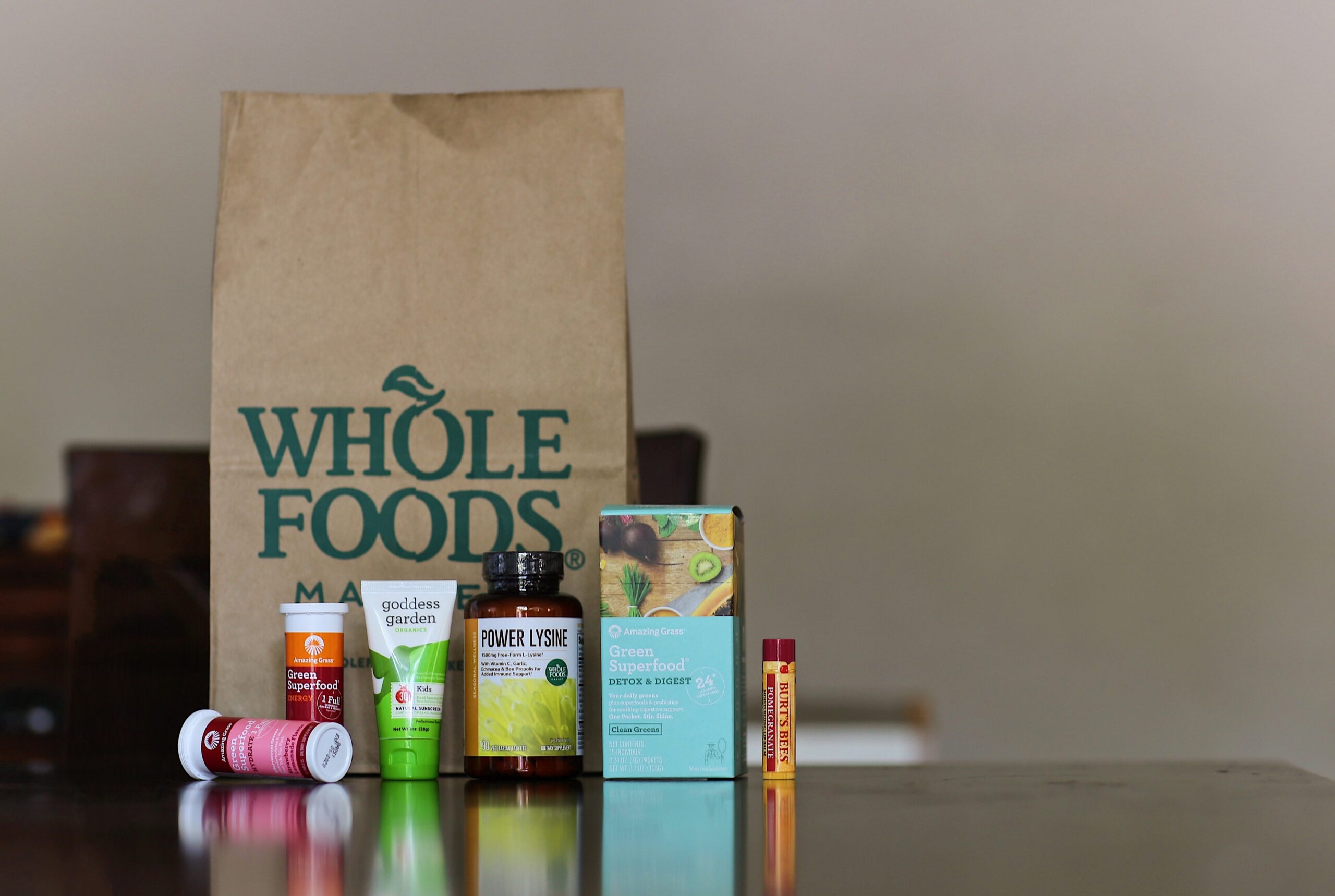 a whole foods bag sits on a table