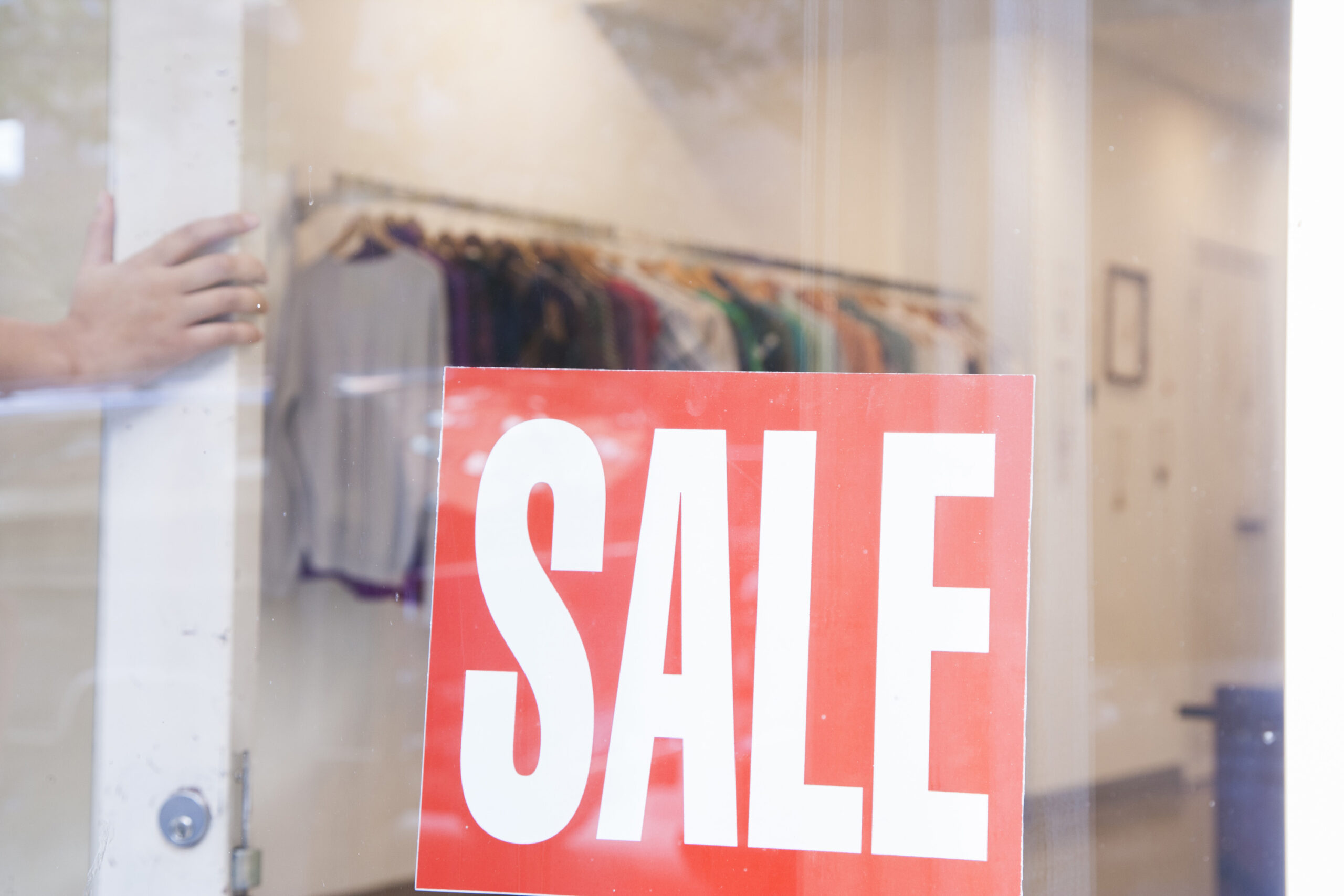 Red sale sign in window