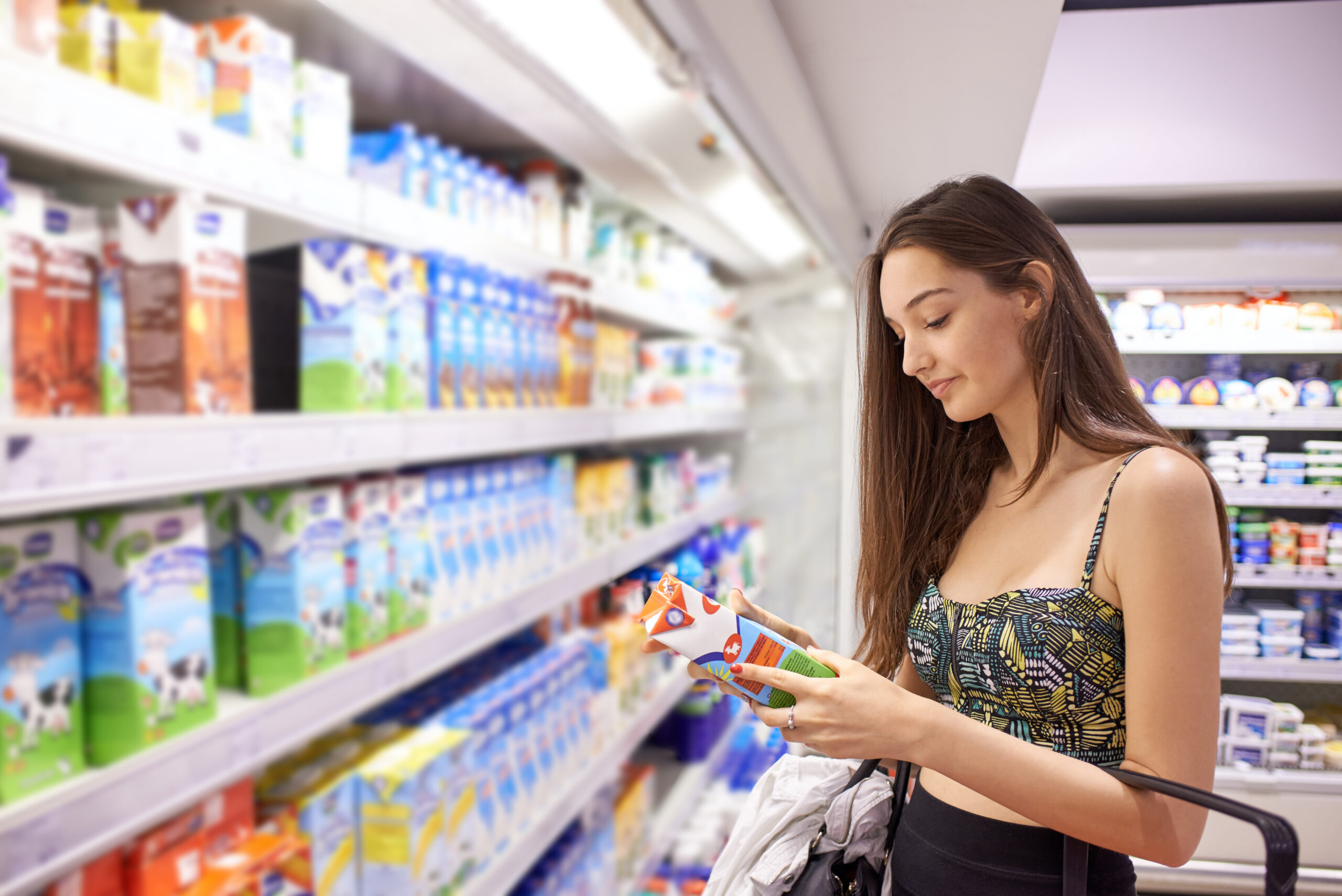 Young woman shopping at a grocery store